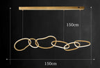 Modern LED Ceiling Pendant Chandelier in gold above a kitchen island