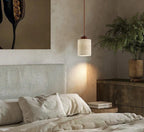 Travertine Stone LED Pendant Light in warm light 3000k over a dining table