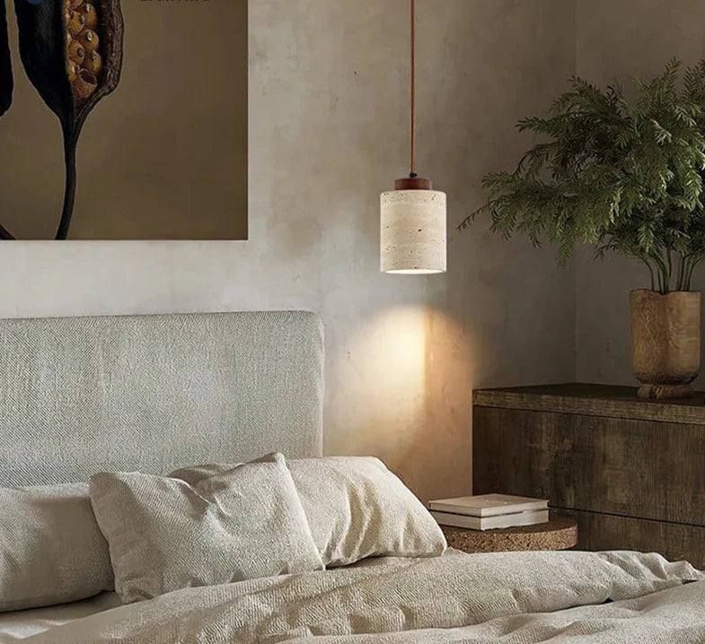 Travertine Stone LED Pendant Light in warm light 3000k over a dining table