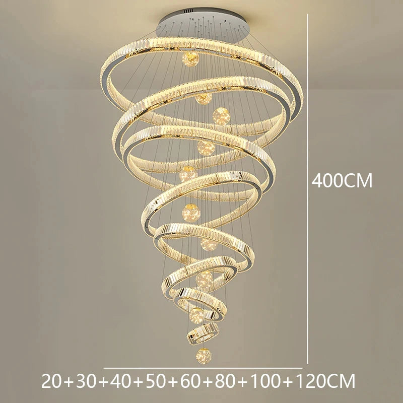 Modern Crystal Staircase Chandelier in gold 2 rings in a living room