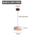 Japanese Travertine Stone Pendant Lamp in travertine lamp b in an entryway