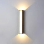 Modern Outdoor LED Strip Wall Lamp in warm white beside a bed