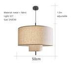 Nordic Wabi-Sabi Fabric Pendant Chandelier in 3 colors light over a dining table