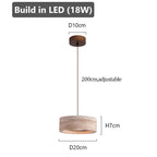 Japanese Travertine Stone Pendant Lamp in warm light 3000k in a living room