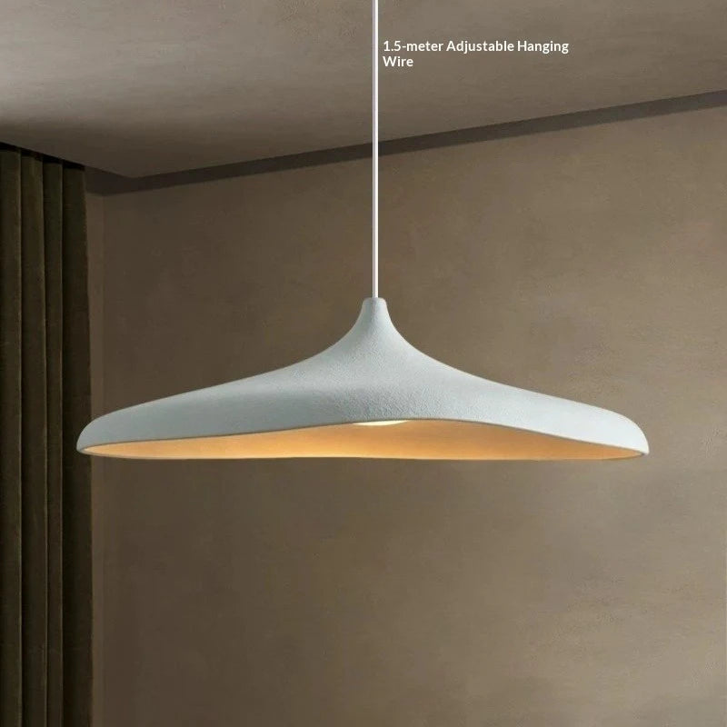 Japanese Wabi-Sabi LED Pendant Light in warm light 3000k over a dining table