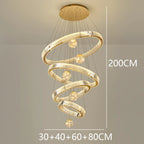 Modern Crystal Staircase Chandelier in gold 6 rings in a living room
