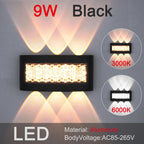 LED Aluminium Outdoor Wall Sconce in b-7w by an entryway