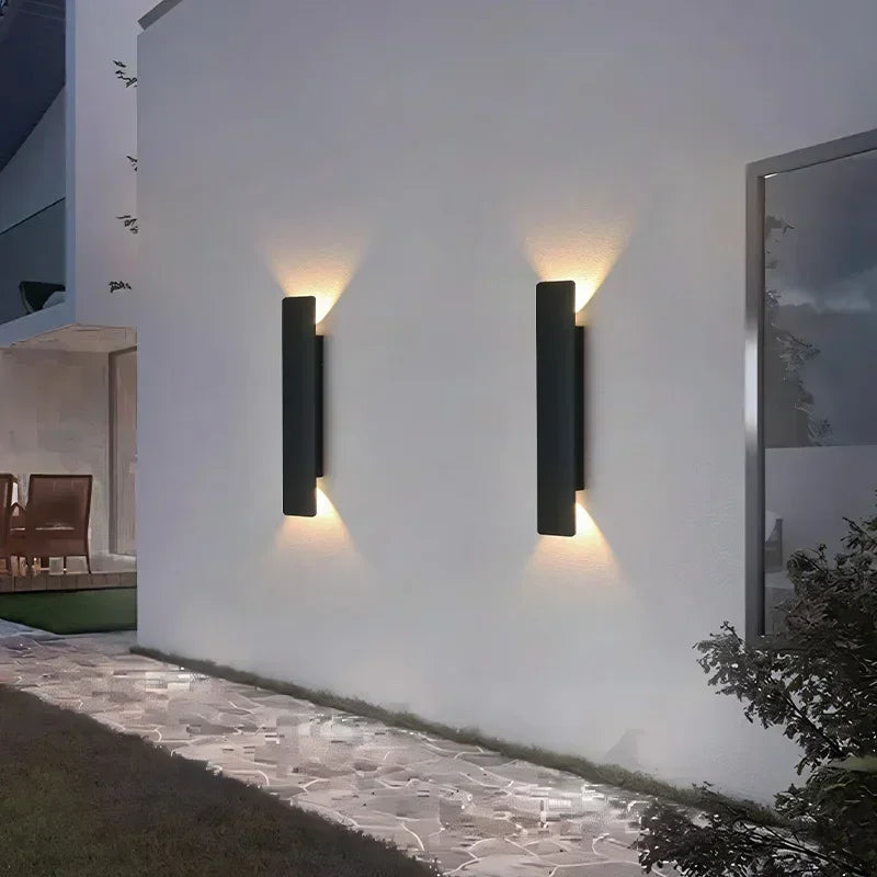Outdoor Waterproof LED Strip Wall Lamp in black body along a hallway