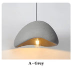 Modern Wabi-Sabi LED Ceiling Chandelier in b white in a dining room