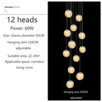 Modern LED Glass Ball Chandelier in cognac above a stairwell
