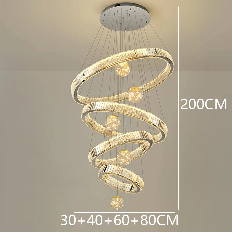 Modern Crystal Staircase Chandelier in gold 8 rings in a dining room