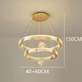 Modern Crystal Staircase Chandelier in silver 4 rings above a stairwell