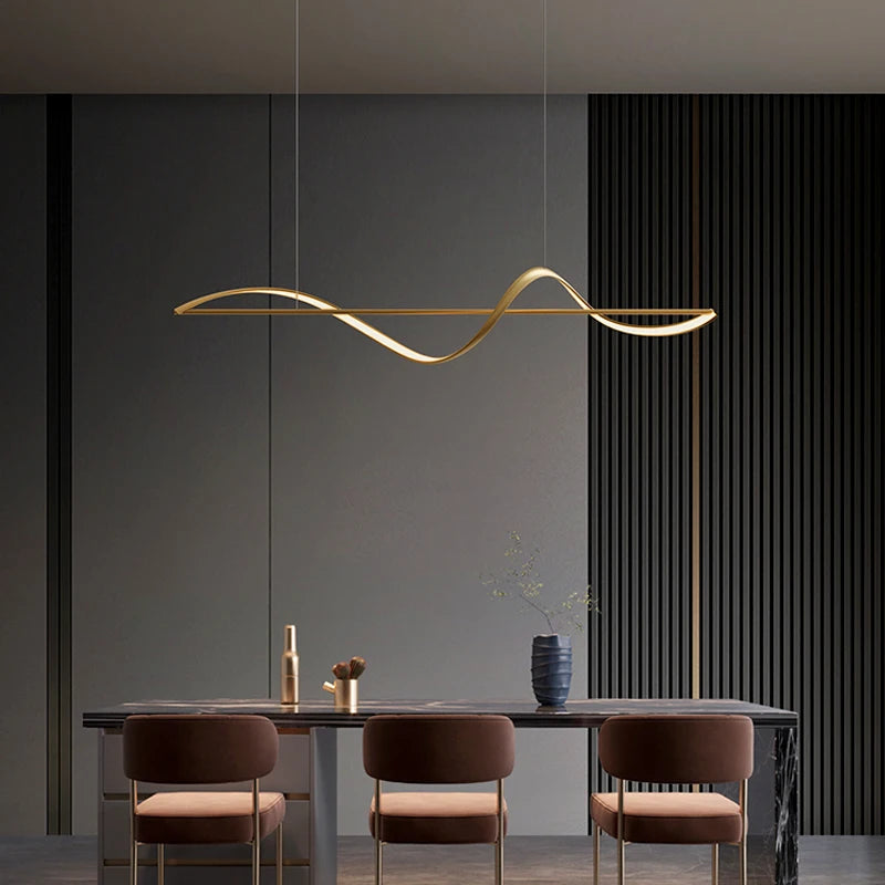 Nordic LED Pendant Chandelier in gold above a kitchen island