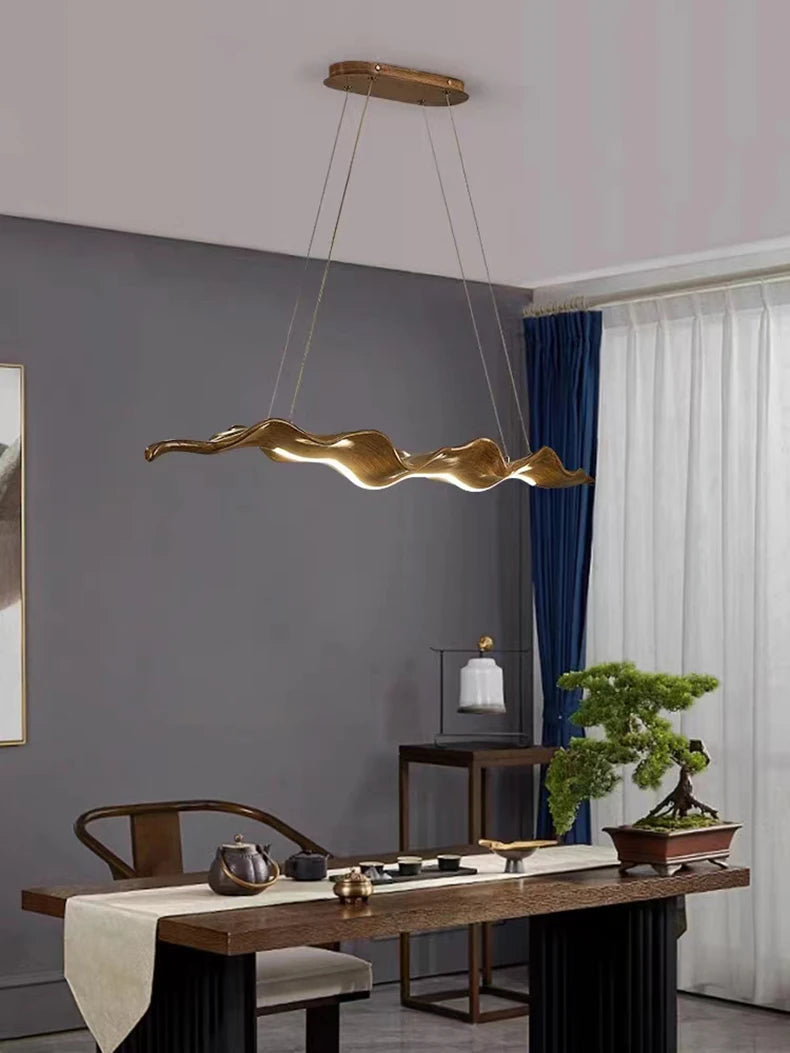 Vintage Resin Leaf Pendant Light in white lamp above a kitchen island