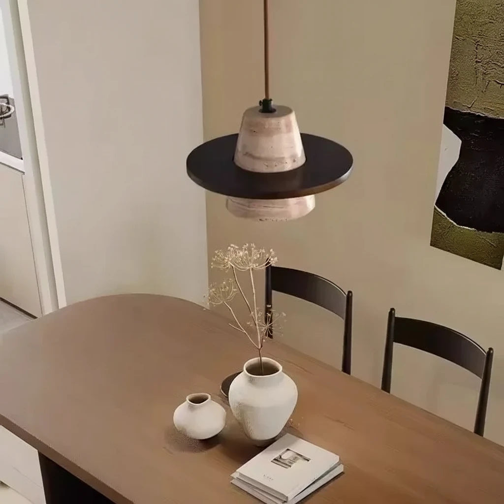Wabi-Sabi Travertine Stone Pendant Light in cold light 6000k over a dining table