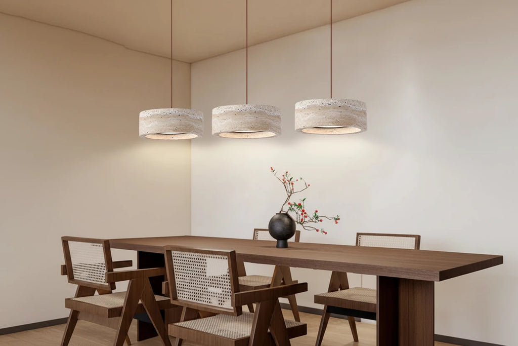 Japanese Travertine Stone Pendant Lamp in travertine lamp b above a kitchen island