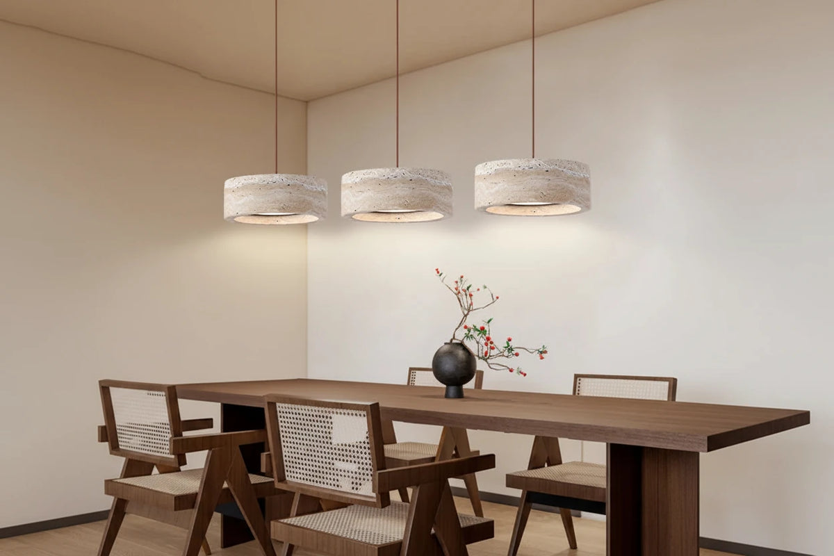 Japanese Travertine Stone Pendant Lamp in travertine lamp b above a kitchen island