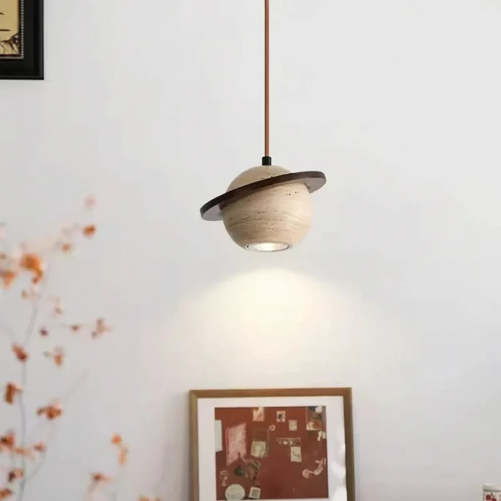Wabi-Sabi Travertine Stone Pendant Light in d-128 walnut above a kitchen island