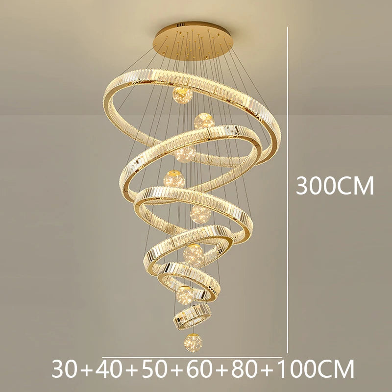 Modern Crystal Staircase Chandelier in tricolor light in an entryway