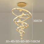 Modern Crystal Staircase Chandelier in tricolor light in an entryway