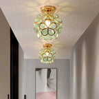 Artistic Glass Ceiling Light with Floral Design - FlowerHall in pink in a hallway
