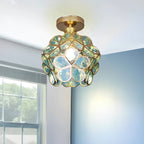 Artistic Glass Ceiling Light with Floral Design - FlowerHall in green in a living room