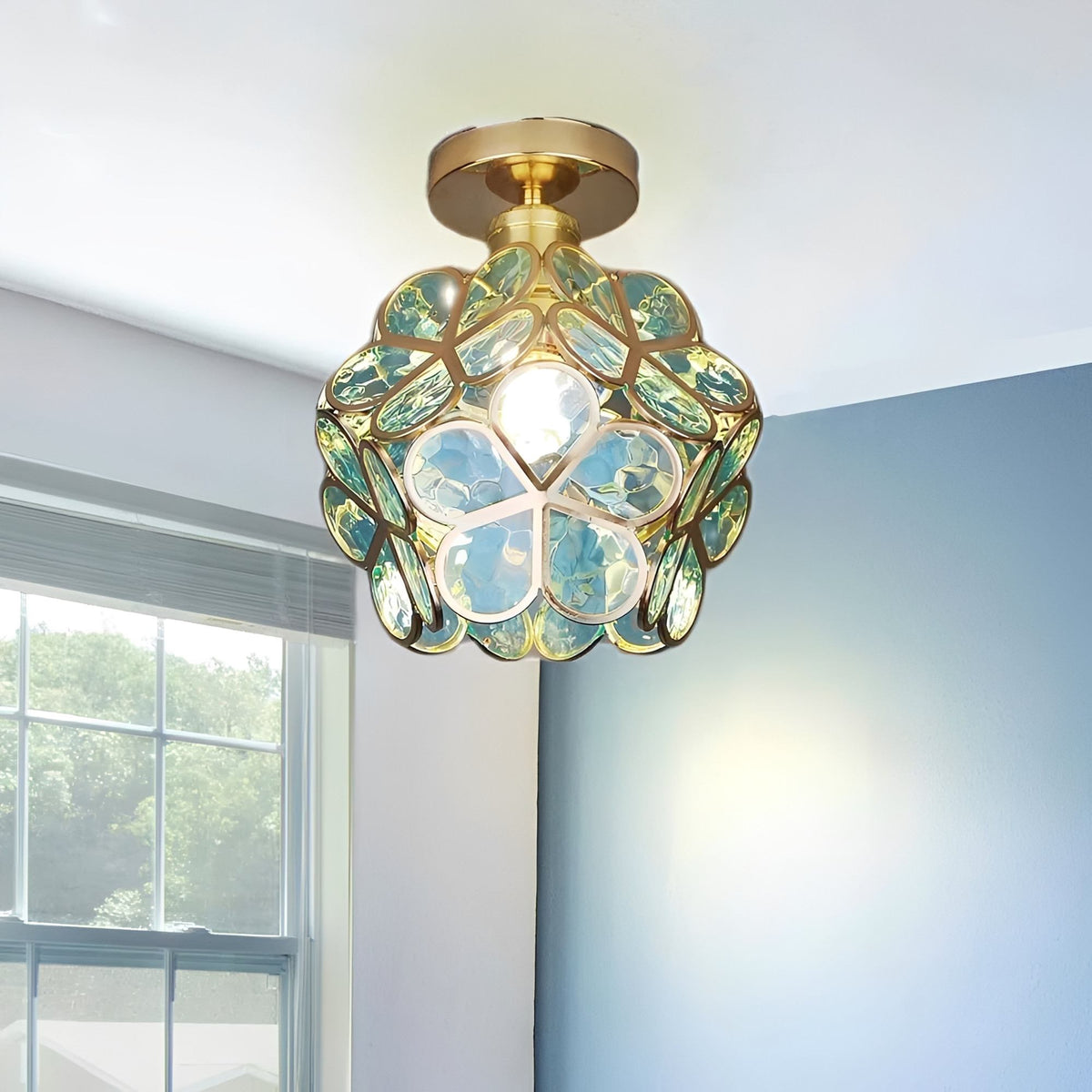 Artistic Glass Ceiling Light with Floral Design - FlowerHall in green in a living room