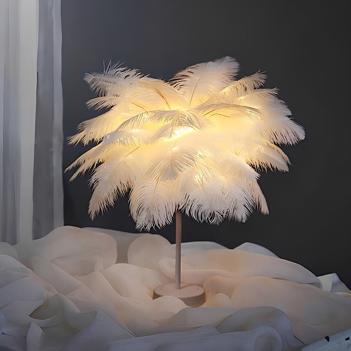 Feather Palm Tree Lamp – LumaPalm Ambient Mood Light in pink on a side table