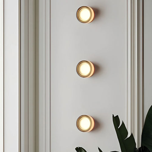 Compact Wall Light - DimpleGlow in smoke along a hallway