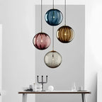 Contemporary LED Pendant Light - LumiWave in brown in an entryway