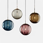 Contemporary LED Pendant Light - LumiWave in red in a living room