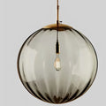 Contemporary LED Pendant Light - LumiWave in blue in a living room