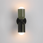 Colourful Up-Down Wall Lamp – Colorwave Double-Sided LED Sconce in red-white beside a bed