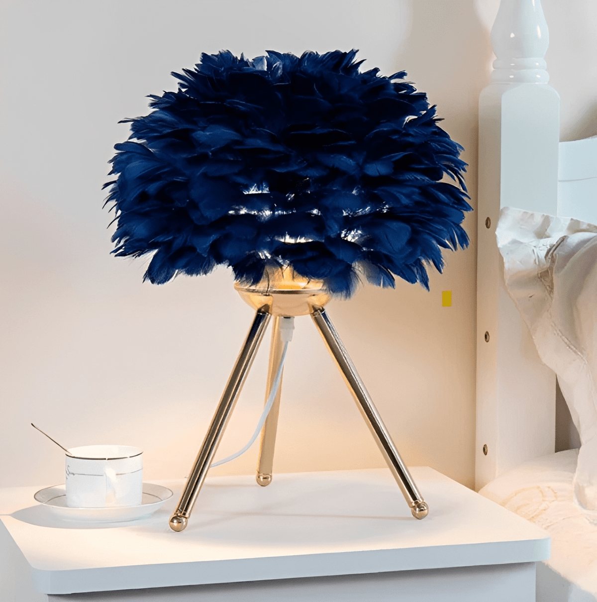 Feather Table Lamp – Pluma Dimmable Ambient Bedside Light in blue in a living room