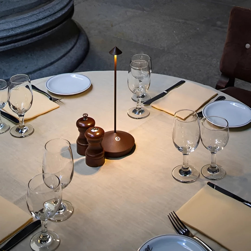 Cordless Dimmable Table Lamp – Serenity Waterproof Touch LED in gold on a desk