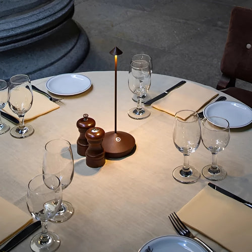 Cordless Dimmable Table Lamp – Serenity Waterproof Touch LED in gold on a desk