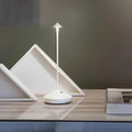 Cordless Dimmable Table Lamp – Serenity Waterproof Touch LED in white on a bedside table
