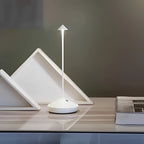 Cordless Dimmable Table Lamp – Serenity Waterproof Touch LED in white on a bedside table