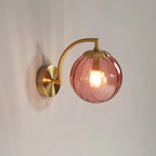 Coloured Glass Wall Lamp – CrystalGlow Modern LED Sconce in coffee beside a bed