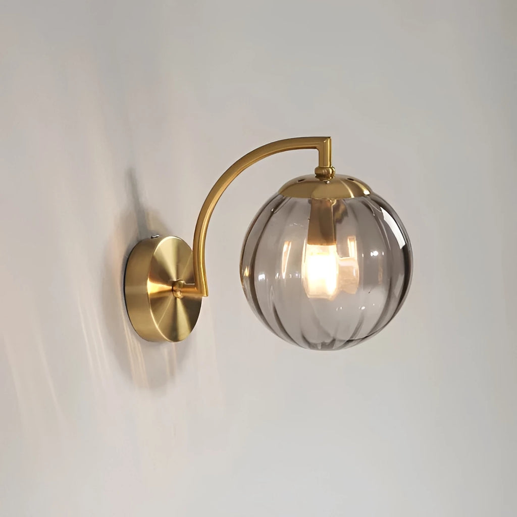 Coloured Glass Wall Lamp – CrystalGlow Modern LED Sconce in red beside a bed