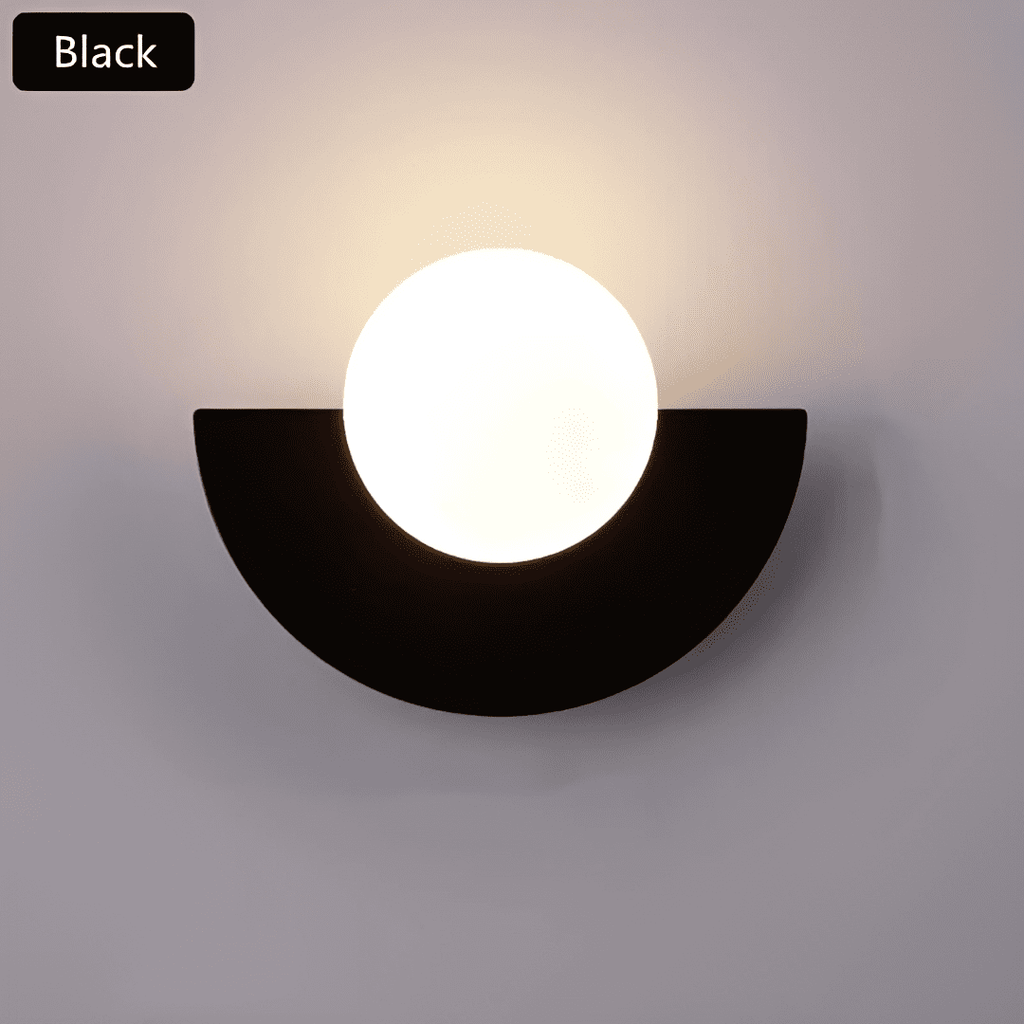 Crescent Moon Wall Lamp – LunaMetal Metal LED Sconce in white beside a bed