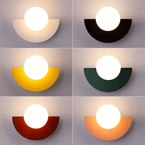 Crescent Moon Wall Lamp – LunaMetal Metal LED Sconce in white beside a bed