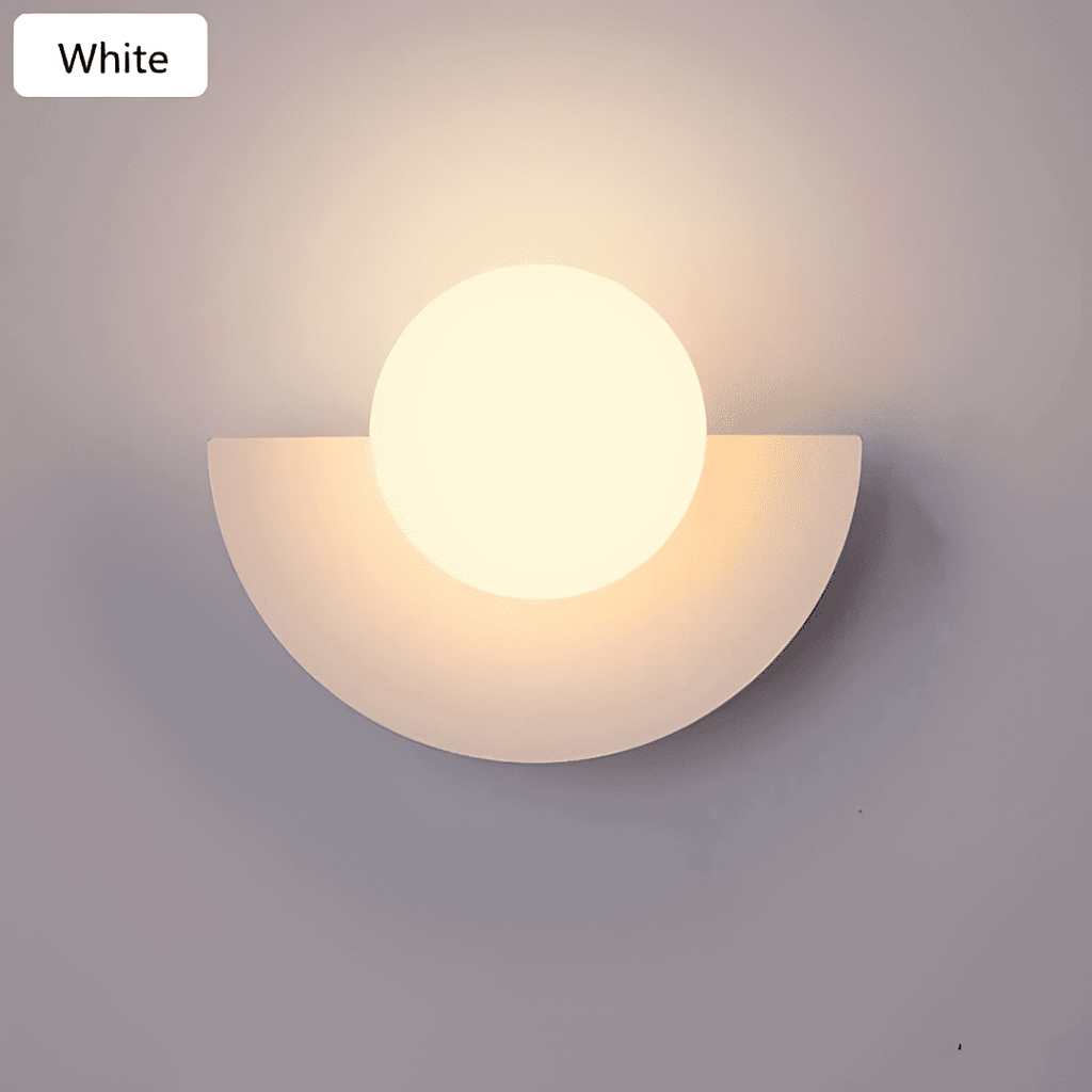 Crescent Moon Wall Lamp – LunaMetal Metal LED Sconce in green in a living room