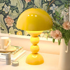Flower Bud Table Lamp – FloraGlow Dimmable Scandinavian Light in yellow for a reading nook