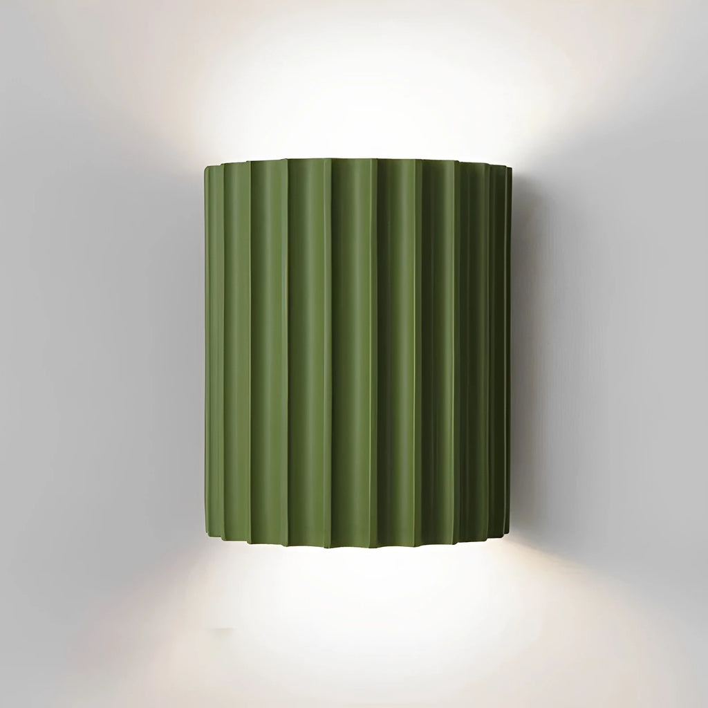 STYLISH RESIN WALL LAMPS - LUMIRESIN in green beside a bed