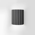 STYLISH RESIN WALL LAMPS - LUMIRESIN in warm white in a living room