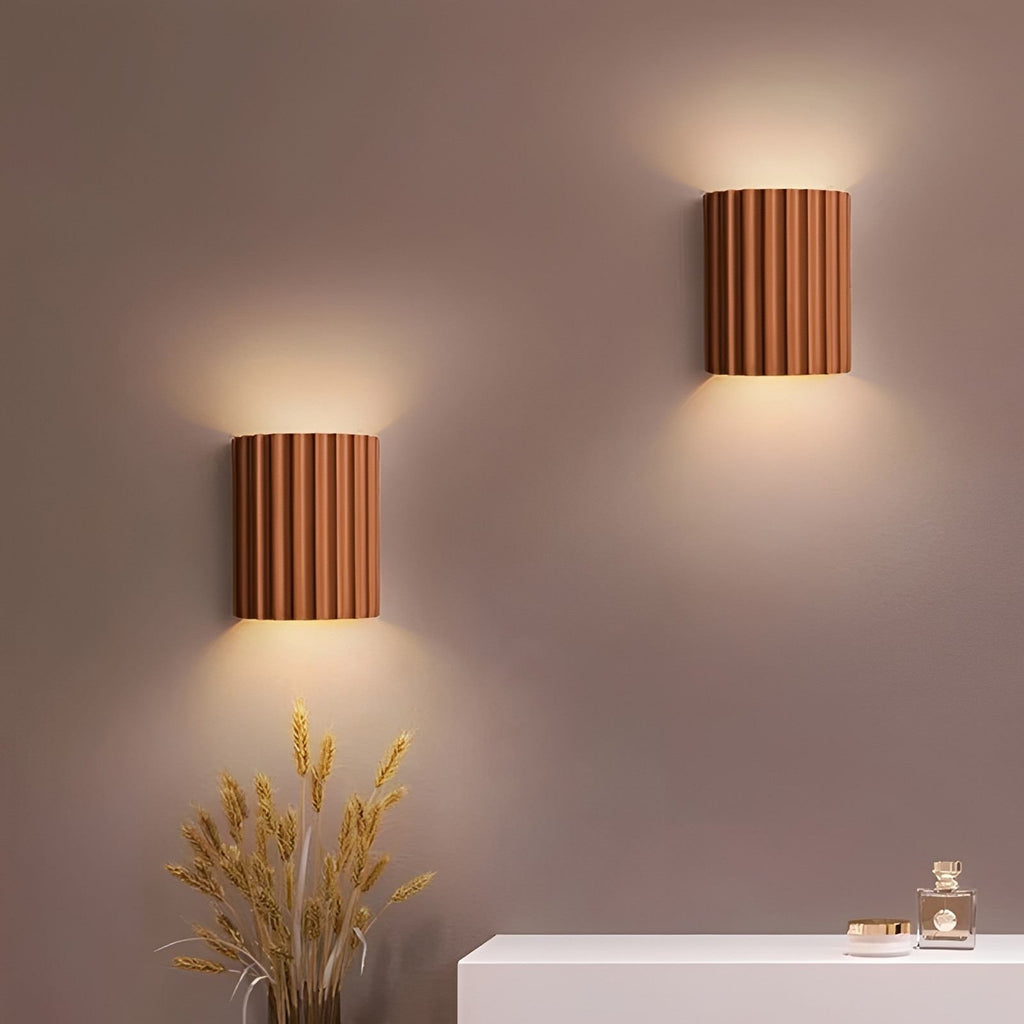 STYLISH RESIN WALL LAMPS - LUMIRESIN in white beside a bed