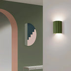 STYLISH RESIN WALL LAMPS - LUMIRESIN in grey along a hallway