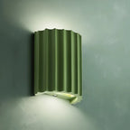 STYLISH RESIN WALL LAMPS - LUMIRESIN in orange in a stairwell