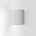 STYLISH RESIN WALL LAMPS - LUMIRESIN in cool white along a hallway